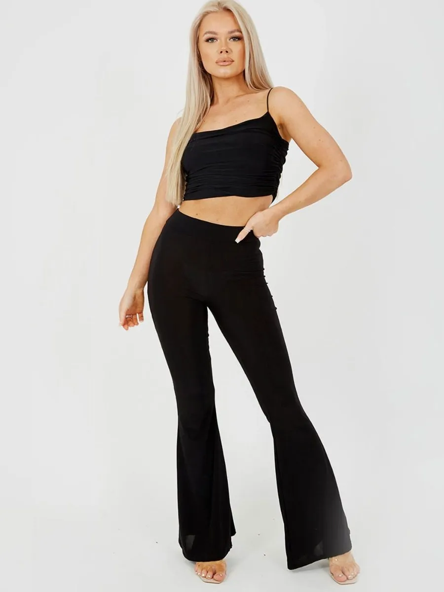 Stevie Scrunch Back Flared Slinky Trousers In Black