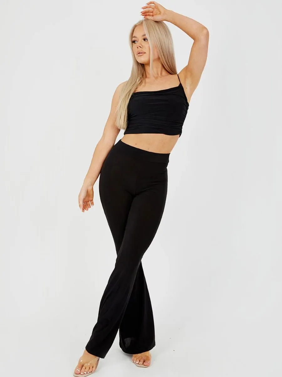 Stevie Scrunch Back Flared Slinky Trousers In Black