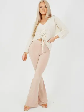 Stevie Scrunch Back Flared Slinky Trousers In Stone