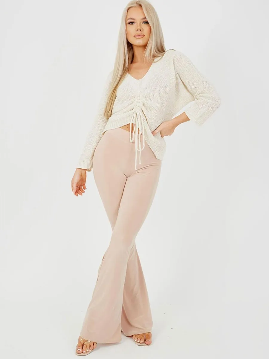 Stevie Scrunch Back Flared Slinky Trousers In Stone